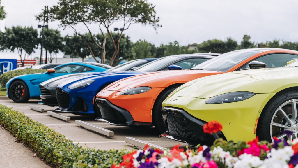 lineup of exotic vehicles in neon bright colors on a sunny day for 10 Common Vehicle Registration Mistakes — And How Ride Legal Helps You Avoid Them