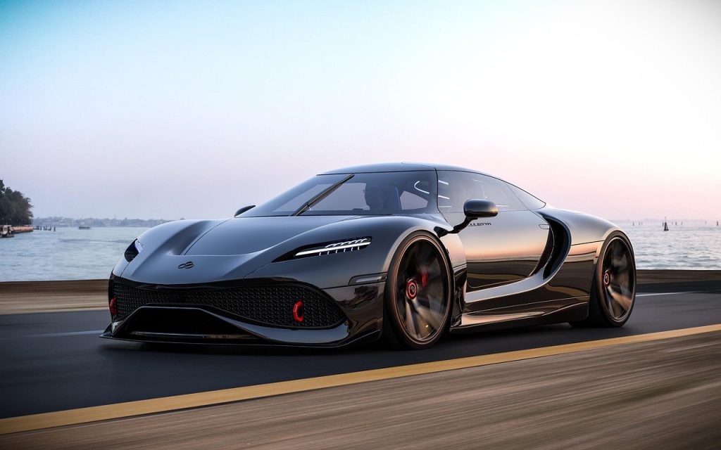 This image features a futuristic black hypercar with aggressive aerodynamic styling, sharp LED headlights, and red brake calipers, cruising along a coastal road at sunset.